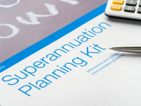 Superannuation Planning Kit document with pen and calculator